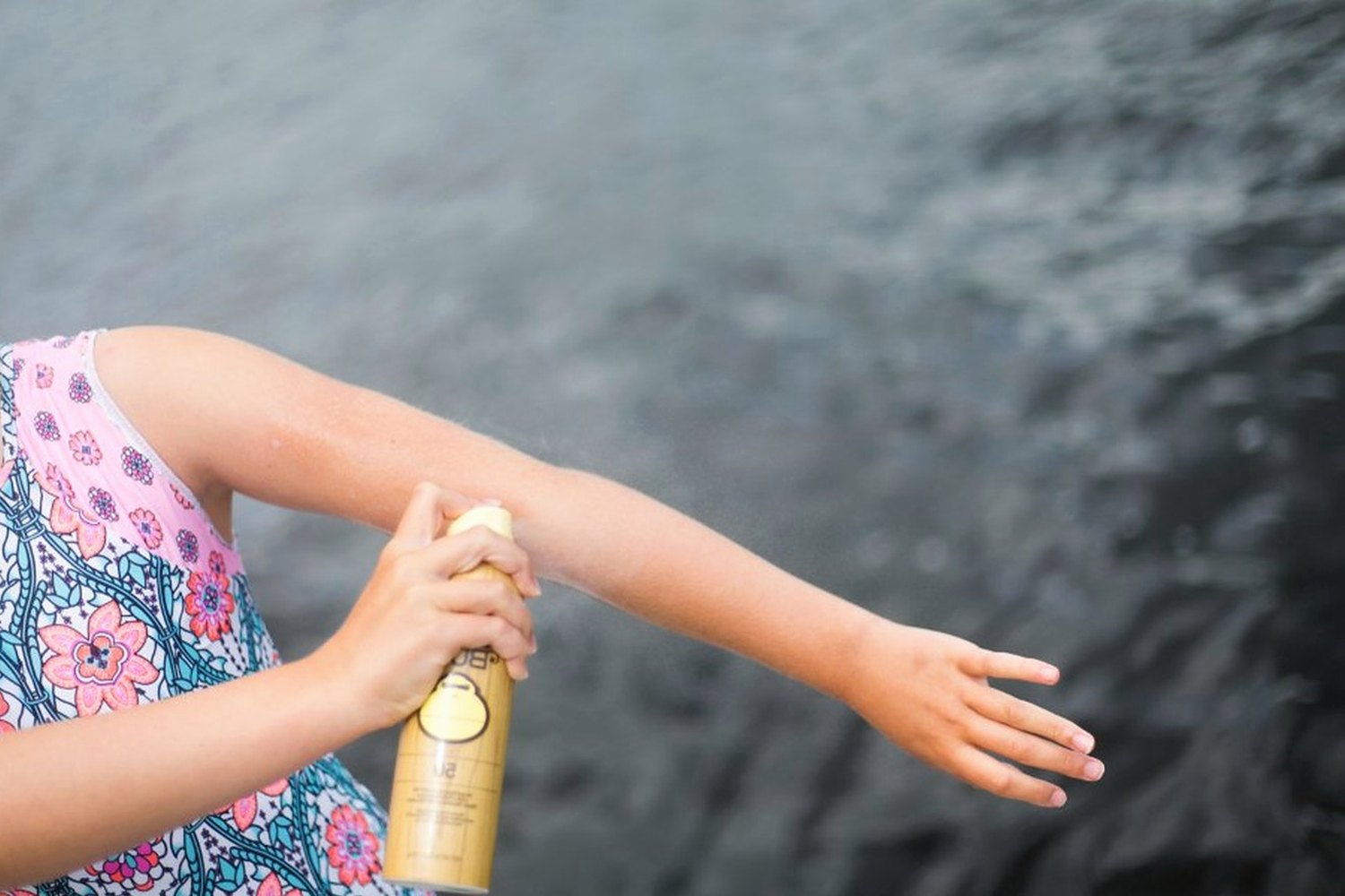 Sunscreen being applied to skin for Neck, ears and hands.