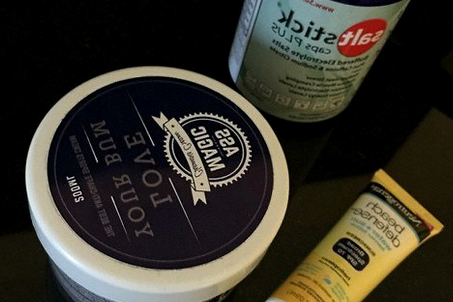 Reapplication stick or tin for Sunscreen for scalp partings and thinning hair.